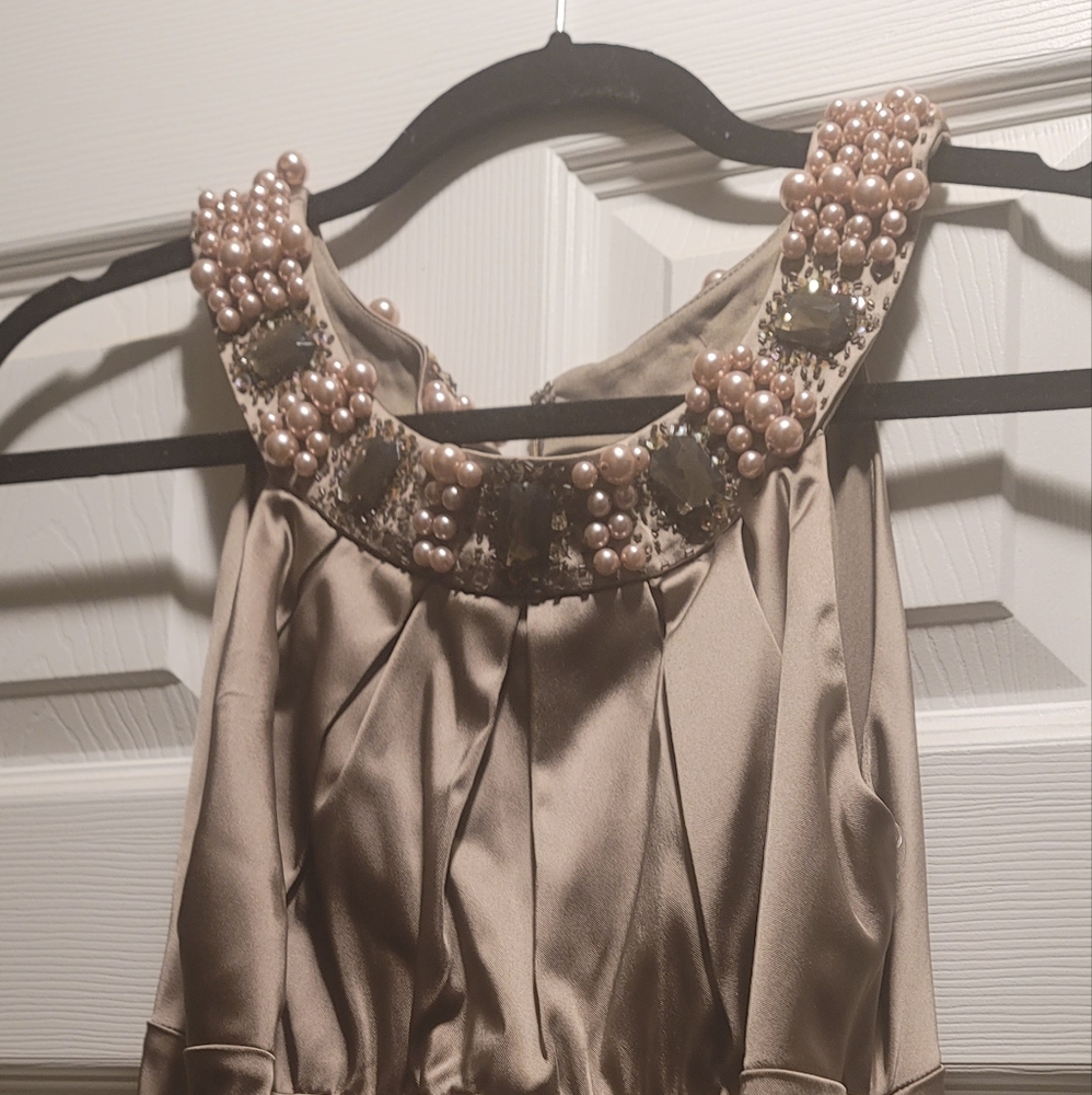 Elegant, fitted, jeweled neckline dress.  Satin stretch.